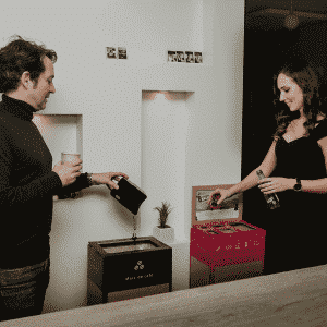 Two employees sorting their waste plus an ecovadis 2021 platinum badge